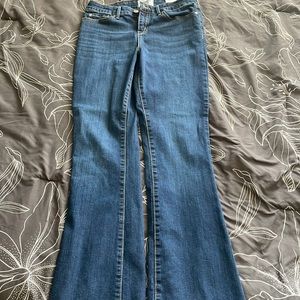 Levis Denizen mid rise Boot cut jean size 28